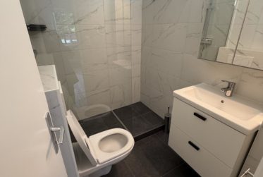 STUDIO RENOVE AU CENTRE DE ROLLE AVEC BALCON