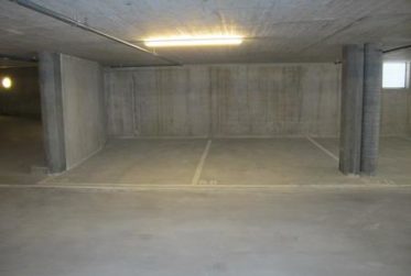 PLACE DE PARKING INTERIEURE (PROXIMITE IMMEDIATE GARE)